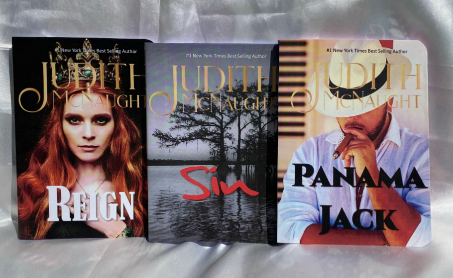 Image of three covers for books supposedly by Judith McNaught: REIGN, SIN, and PANAMA JACK