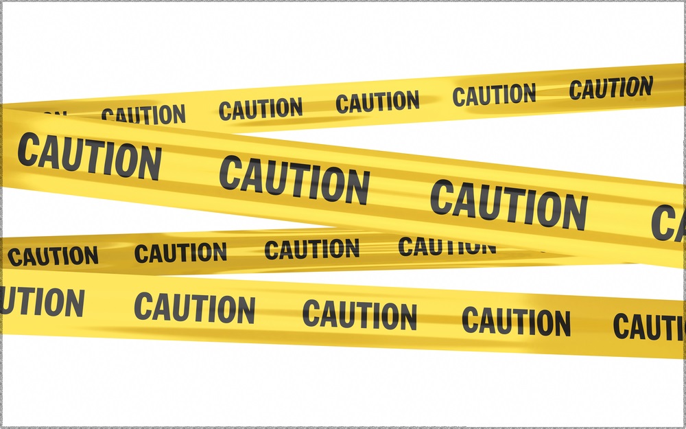 Header image: Zigzags of yellow Caution tape on a white background (credit: heromen30 / Shutterstock.com)