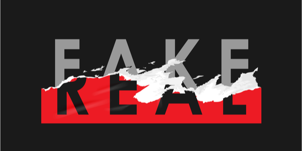 Header image: the word "real" fading away and being replaced by the word "fake" (Credit: Net Vector / Shutterstock.com)