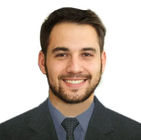 Image of "David Pecker": Youngish man with short dark hair and beard, blue shirt, navy tie and jacket on a flat white background. 